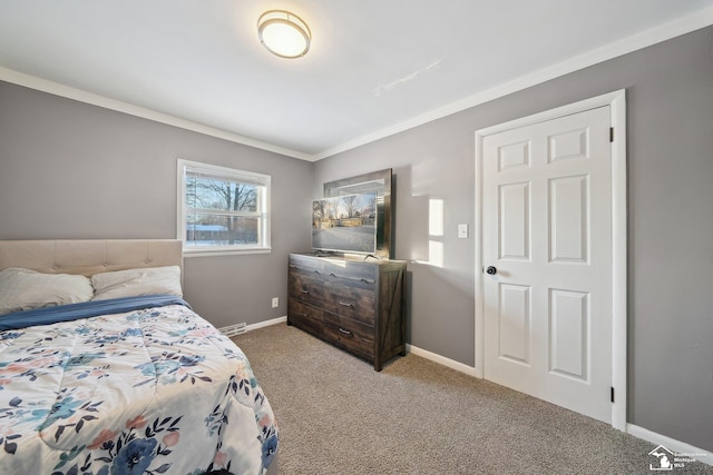 carpeted bedroom with ornamental molding