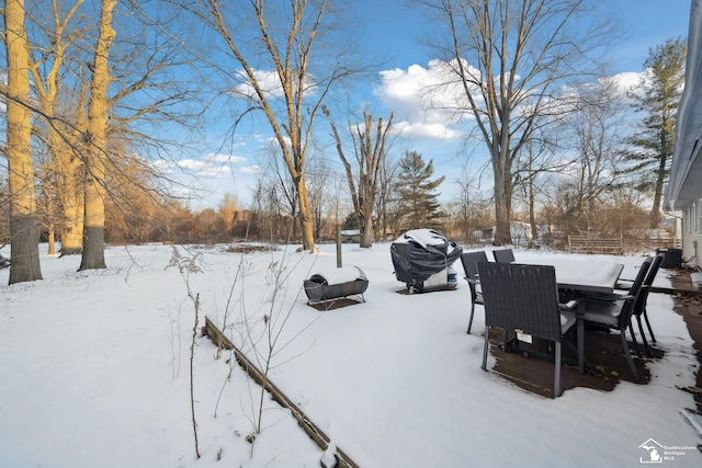 view of yard layered in snow