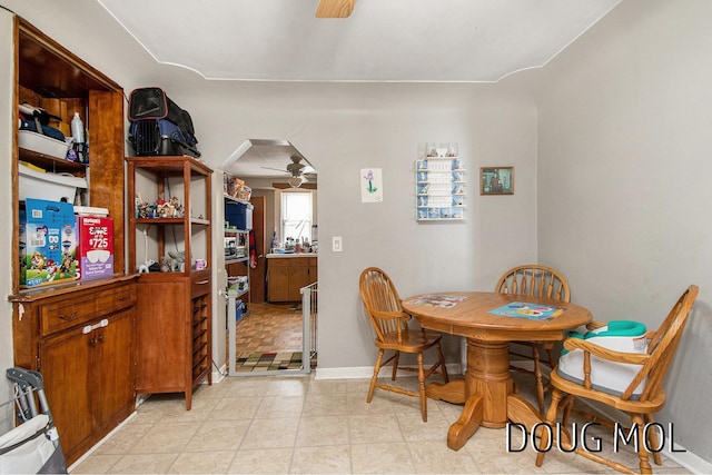 dining room featuring ceiling fan