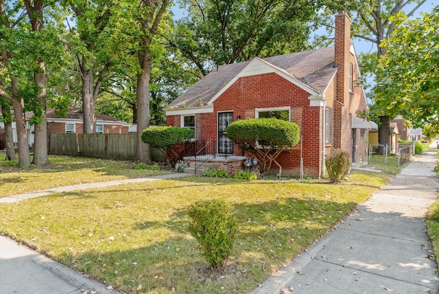 bungalow with a front yard