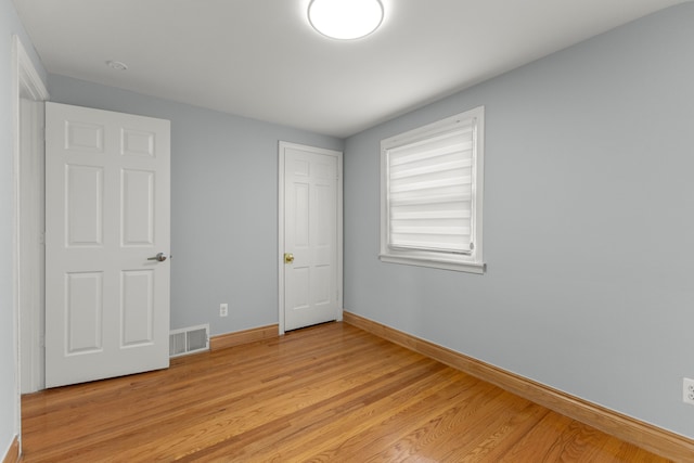 unfurnished bedroom with light hardwood / wood-style floors