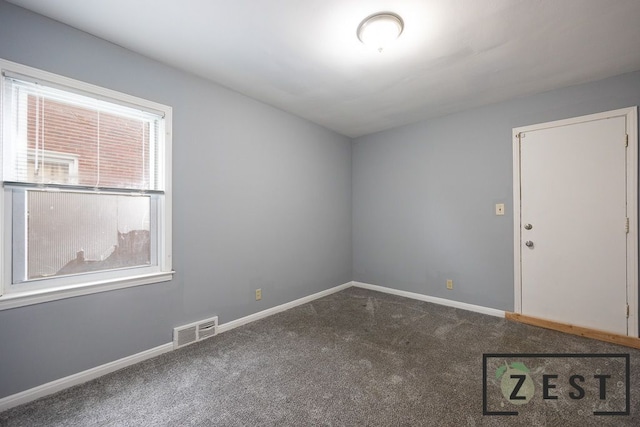 view of carpeted spare room