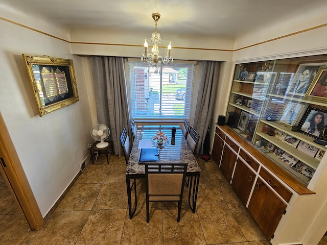 dining space featuring an inviting chandelier