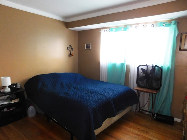 bedroom featuring hardwood / wood-style flooring