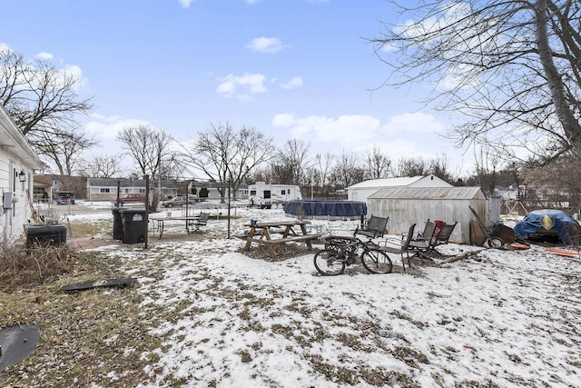 view of yard covered in snow