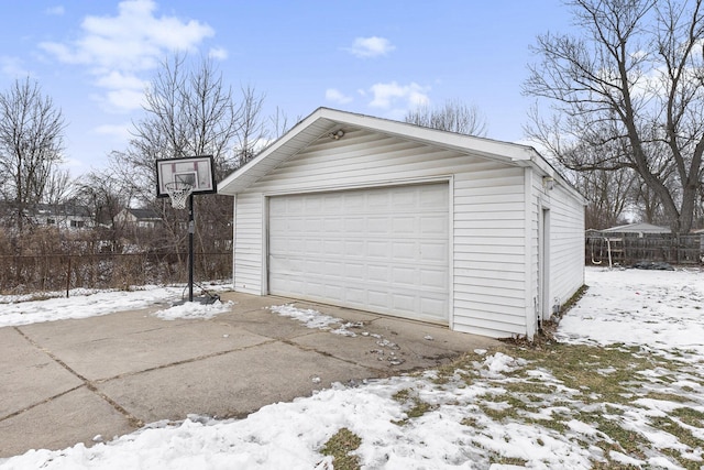 view of snow covered garage