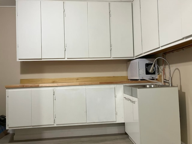 interior space featuring white cabinetry