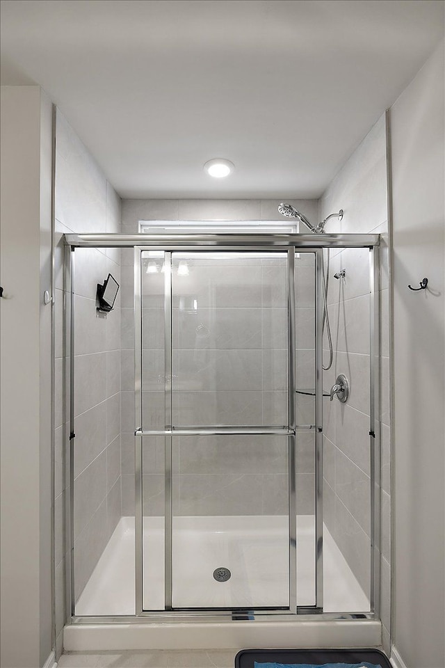 bathroom with an enclosed shower