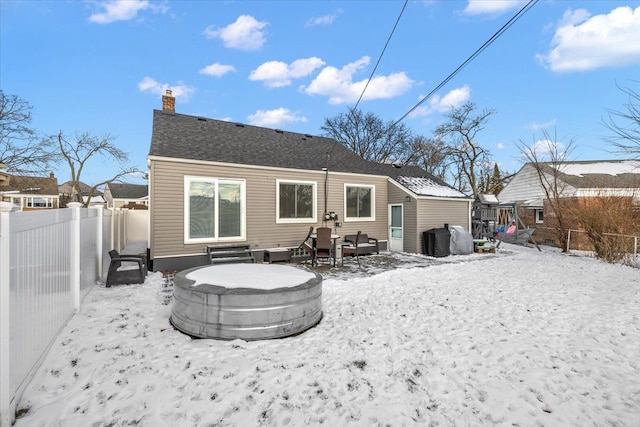 view of snow covered property