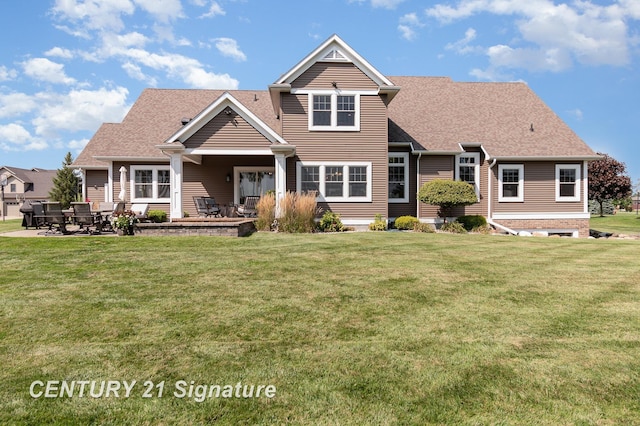 view of front facade featuring a patio area and a front lawn