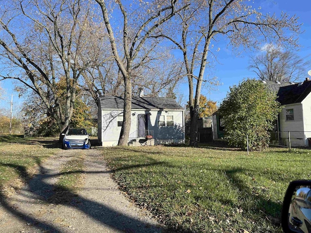 exterior space with a front yard