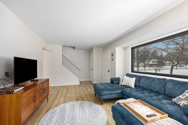 living room with light hardwood / wood-style floors