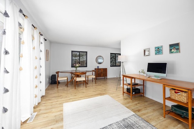 office area with light wood-type flooring