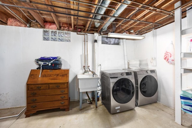 laundry area with washing machine and dryer