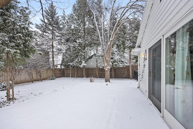 view of yard covered in snow