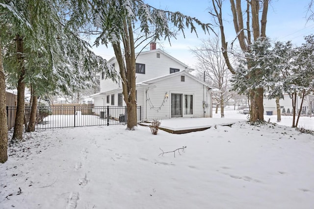 view of snow covered property