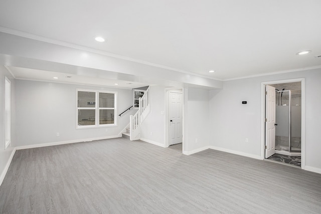 interior space featuring baseboards, stairs, ornamental molding, recessed lighting, and wood finished floors