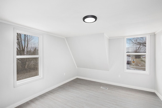 spare room featuring hardwood / wood-style flooring