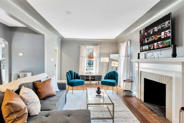 living room featuring a fireplace