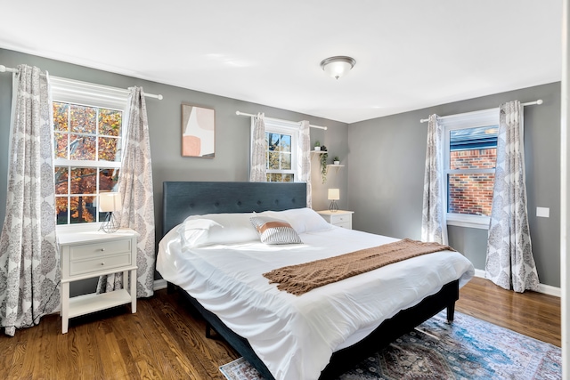 bedroom featuring dark hardwood / wood-style floors