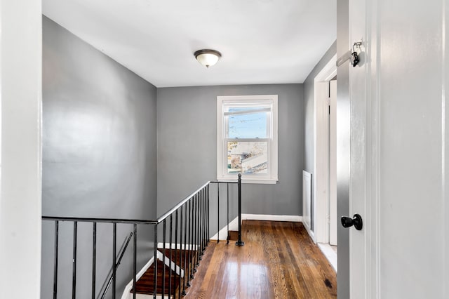 stairway with wood-type flooring