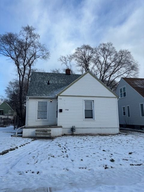 view of snow covered property