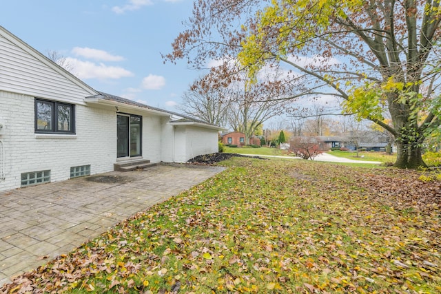 view of yard with a patio