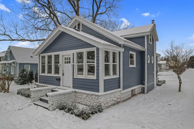 view of snow covered property