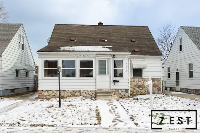 view of snow covered property