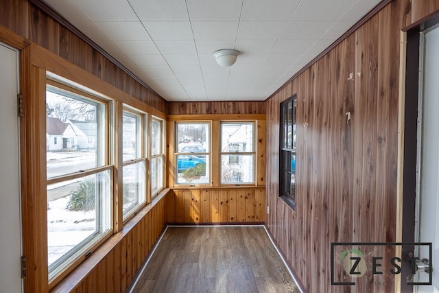 unfurnished sunroom with a wealth of natural light