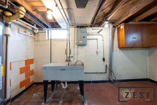 basement featuring sink and electric panel