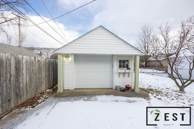 view of snow covered garage