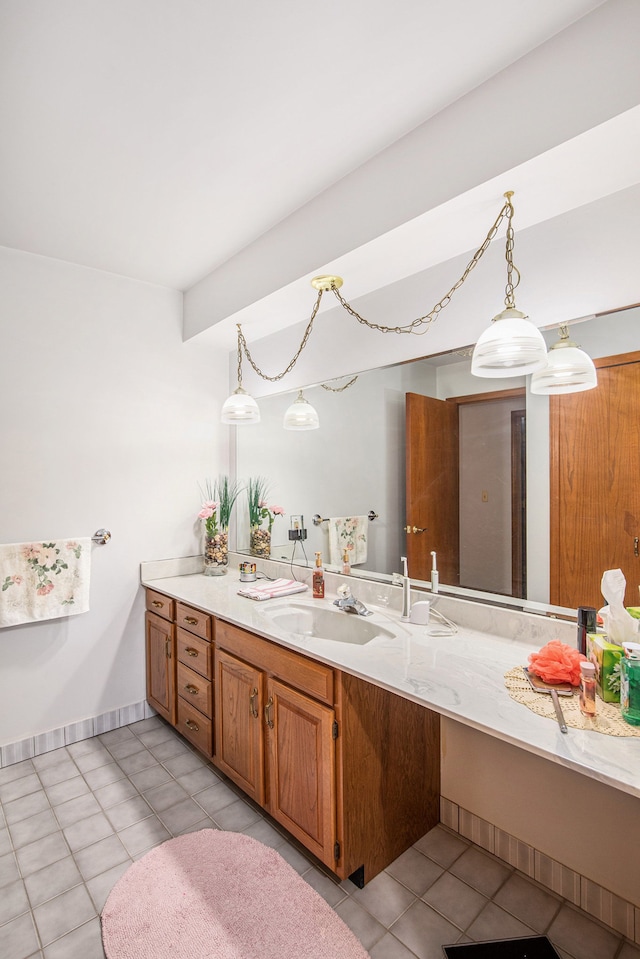 bathroom featuring vanity and tile patterned flooring