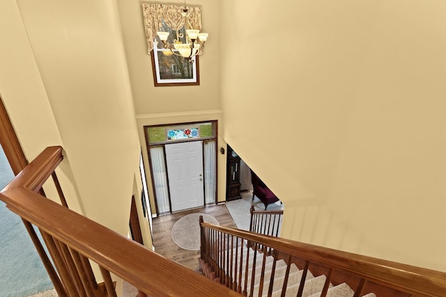 foyer featuring a chandelier