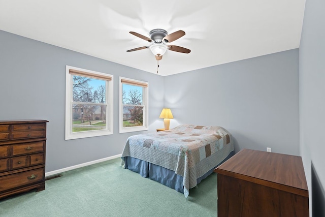 bedroom featuring ceiling fan and carpet flooring