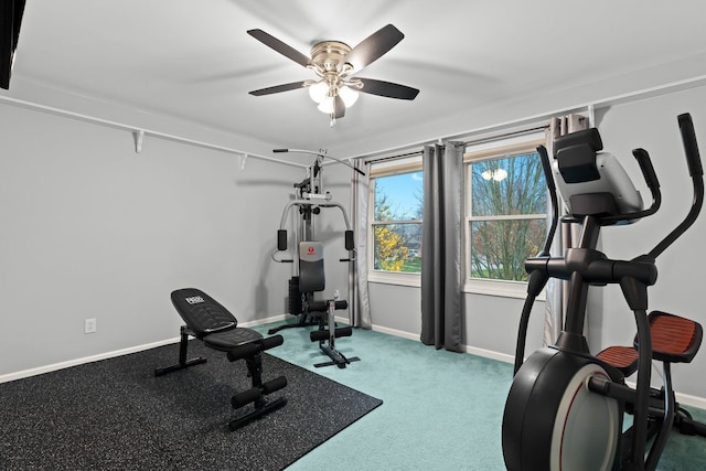 exercise room with carpet floors and ceiling fan