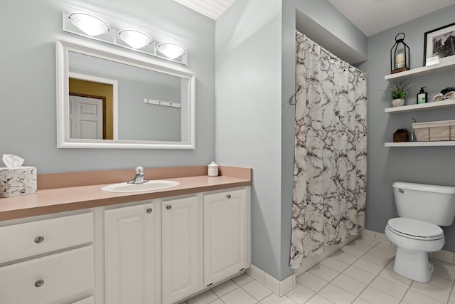 bathroom with vanity, curtained shower, tile patterned floors, and toilet