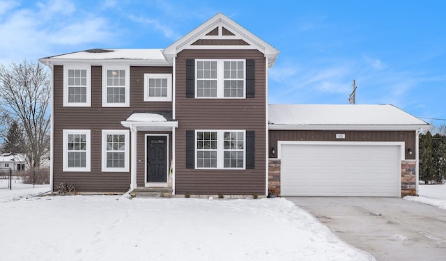 view of front of property with a garage