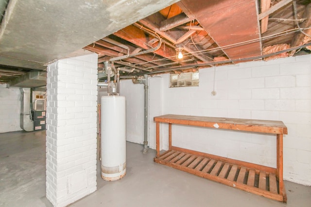 basement with gas water heater and heating unit