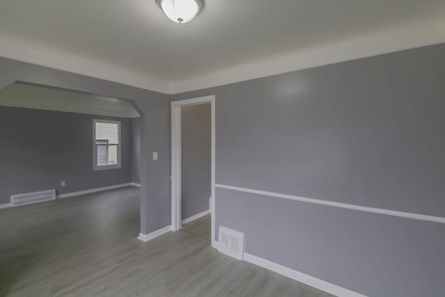 unfurnished room featuring light wood-type flooring