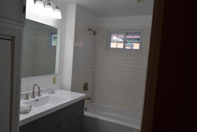 bathroom with bathtub / shower combination and vanity