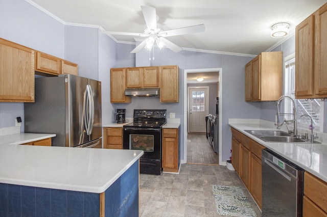 kitchen with appliances with stainless steel finishes, sink, ornamental molding, washer and dryer, and ceiling fan