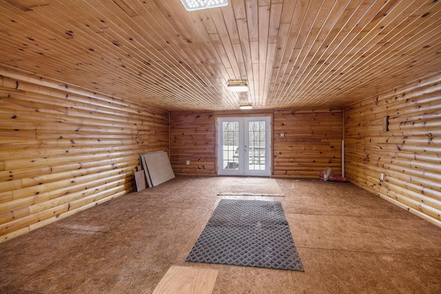 bonus room featuring wood ceiling, french doors, and rustic walls