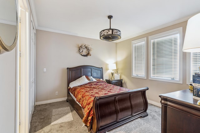 carpeted bedroom with crown molding