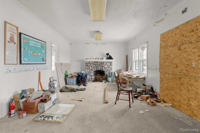 interior space featuring a fireplace and ornamental molding