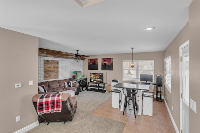 tiled living room with ceiling fan