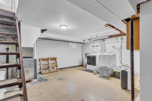 basement featuring washer and dryer