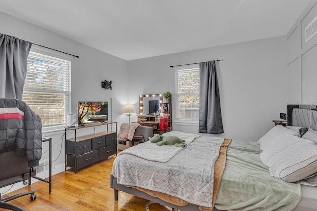 bedroom with light hardwood / wood-style flooring