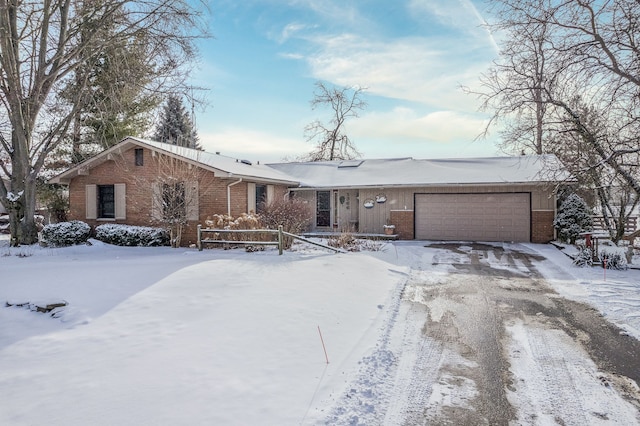 ranch-style home with a garage