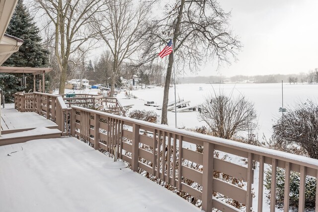 view of snow covered deck